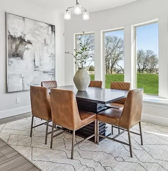 Dining table with leather chairs